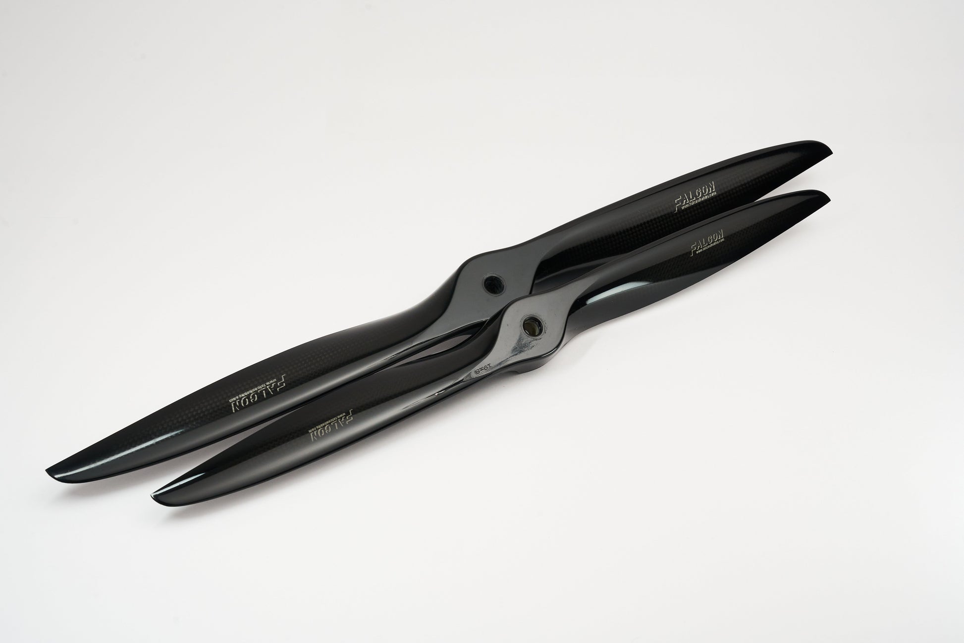 High-performance two-blade carbon fiber propeller by Falcon, ideal for petrol RC planes and aerobatic flying